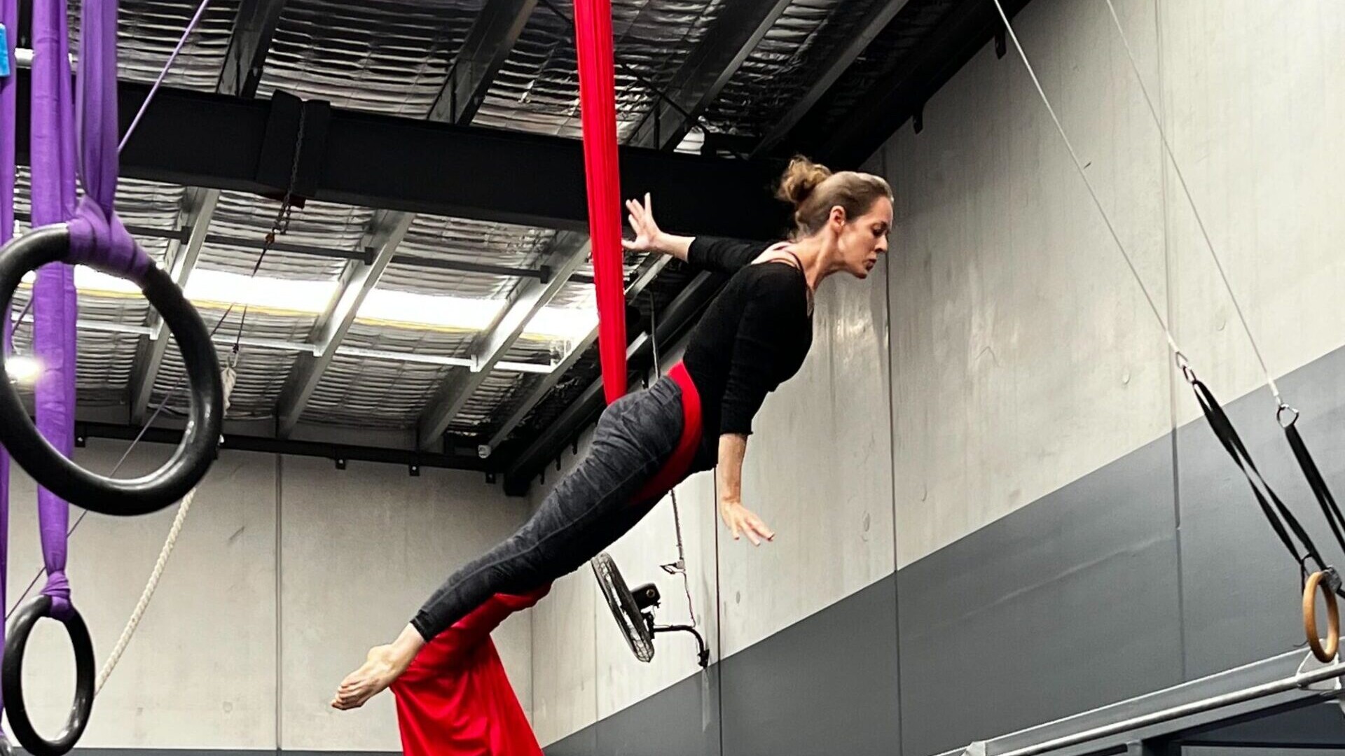 Intermediate Teen Acrobatics 20221128 010527477 iOS 1 scaled e1701400198504 uai at a Ninja Warrior gym in Melbourne, Australia.